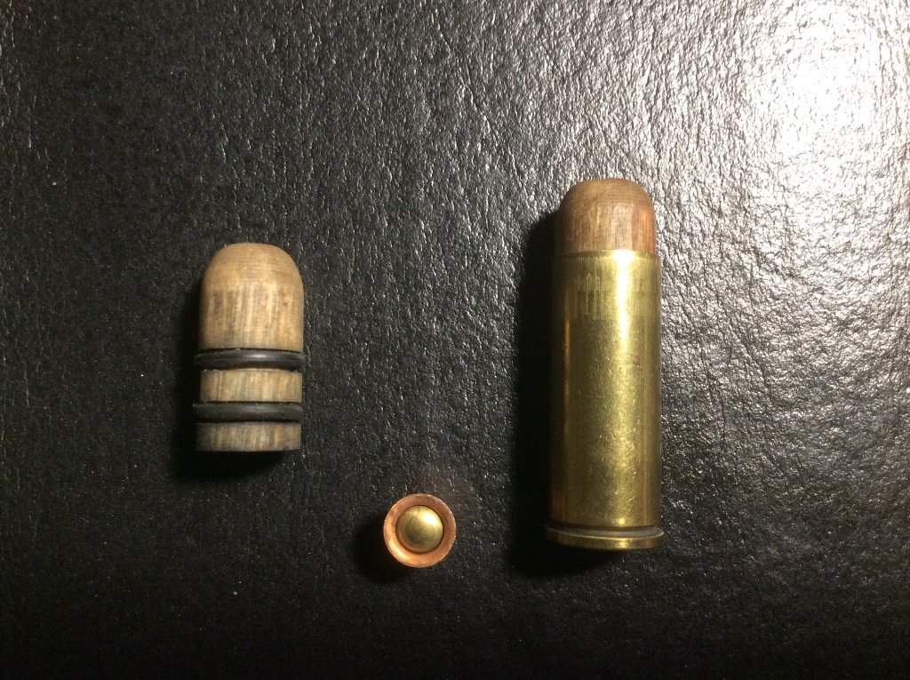 45 colt wooden bullets and 209 primer.jpg
