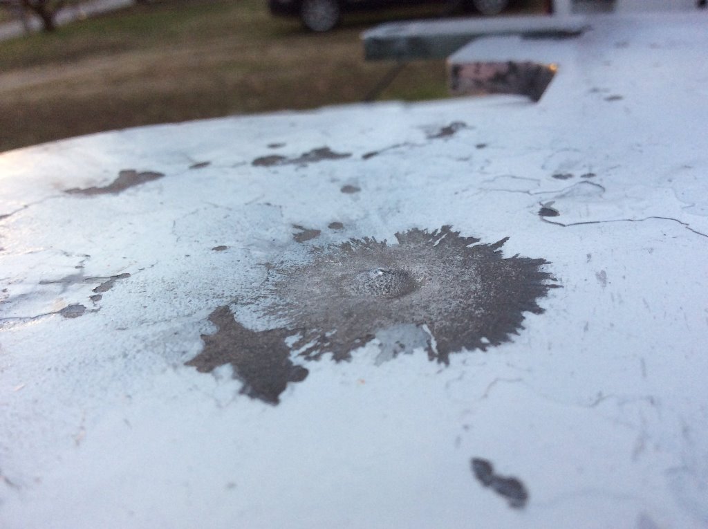 dimple from 125 gr. 357 round on AR500 plate.jpg