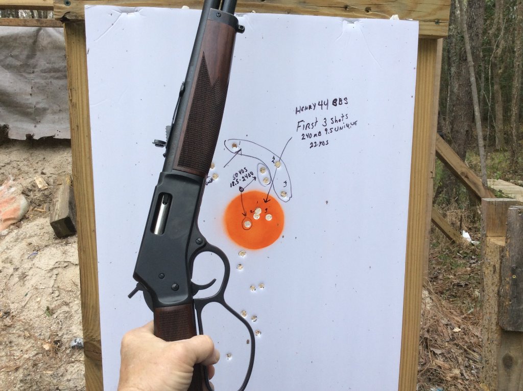 Dialing in the ghost ring sight on 44 Henry.jpg