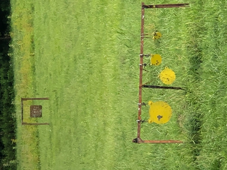 My wife’s dad’s pasture field.  After his wife passed Chris and I bought and placed the steel.  Grandpa loves to shoot.  He especially likes to hear that big gong hit.  Hitting it with a handgun makes the old guy giggle like a school girl.