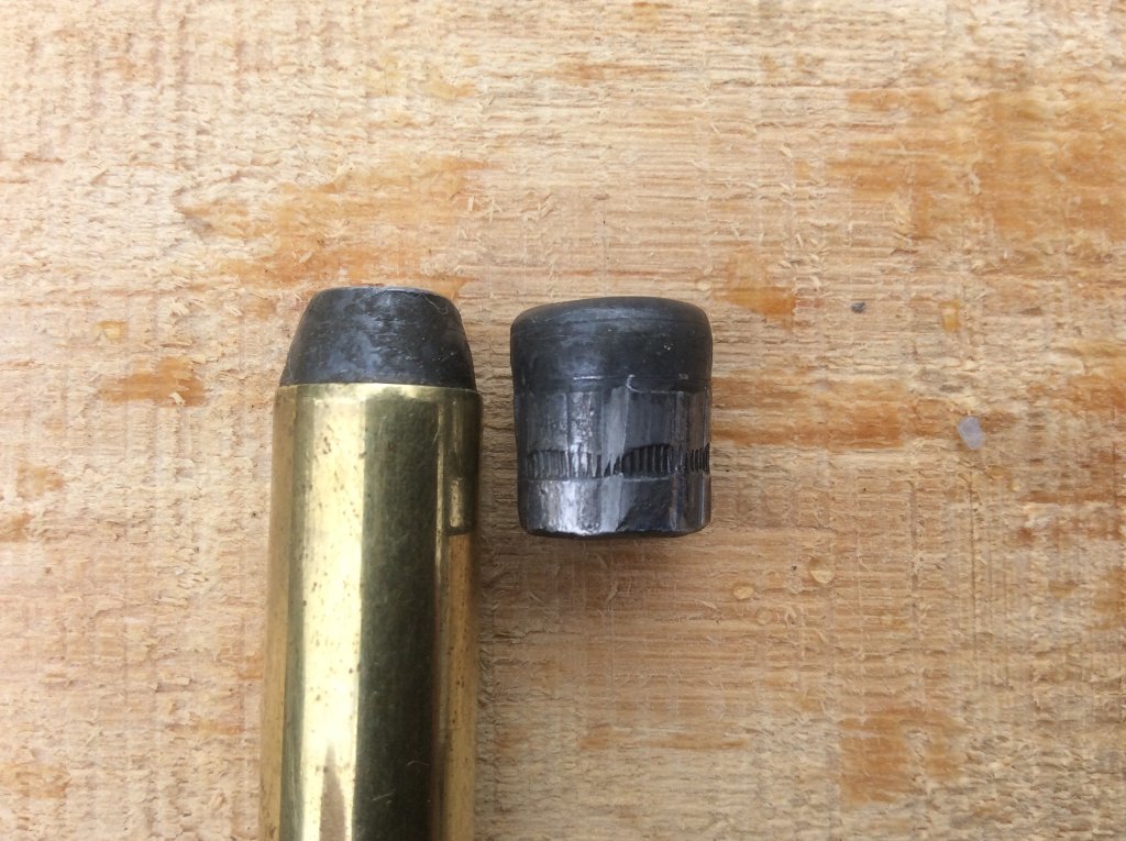 my 200 gr custom hollow point before and after water jug test.jpg