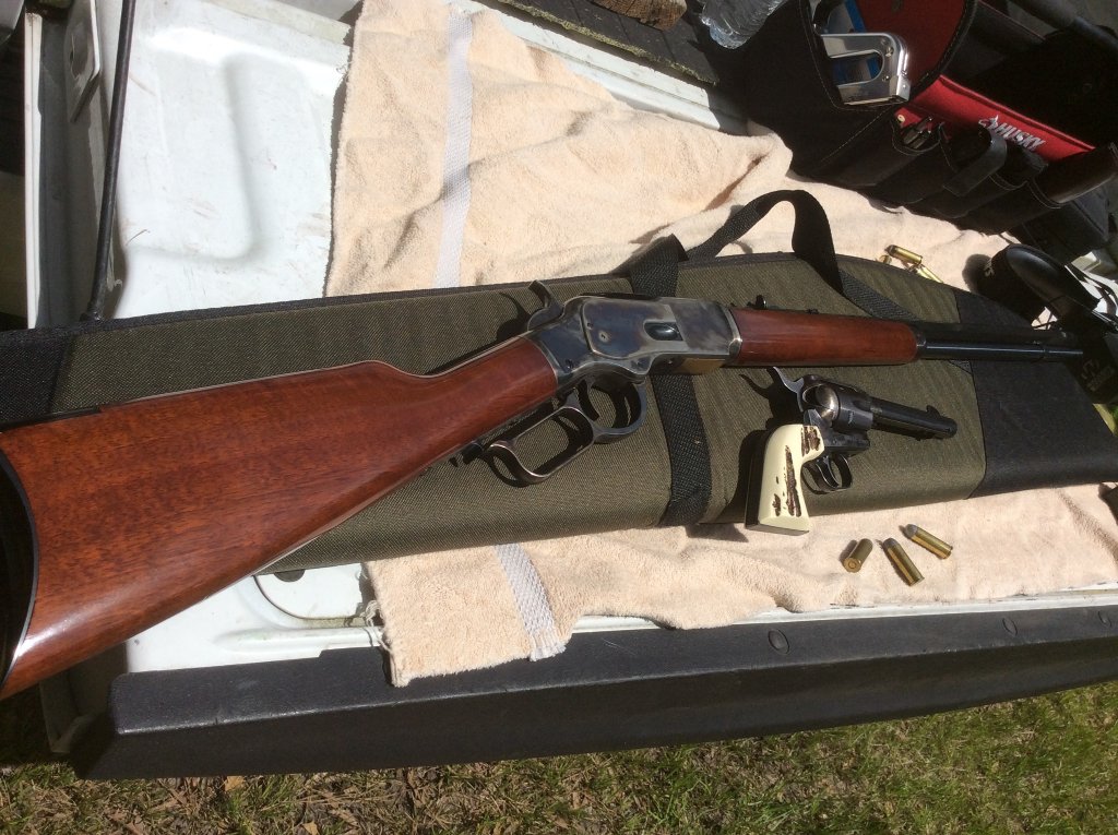 1873 winchester and ruger new vquero 45 colt.jpg