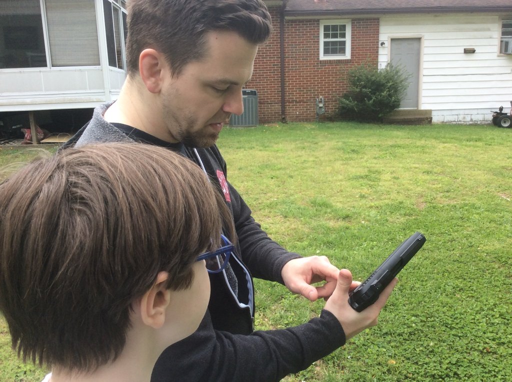 Chad teaching Macie about the Gamp PT 85 Co2 Blowback pistol.jpg