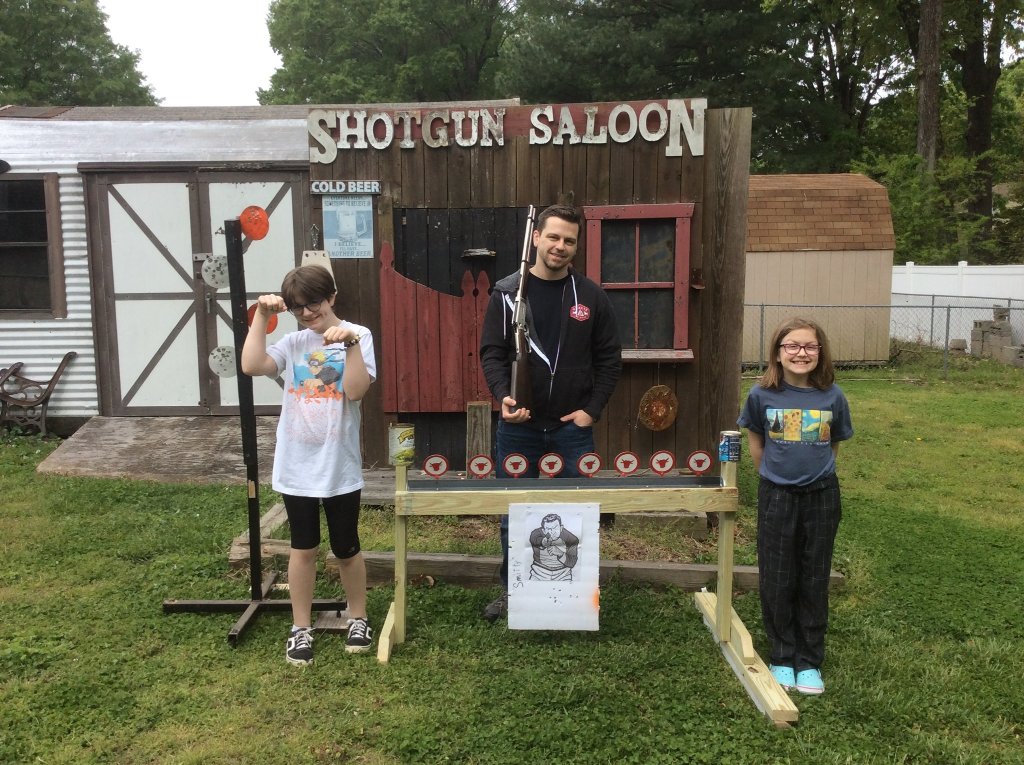 Backyard air rifle fun with Chad and the girls.jpg