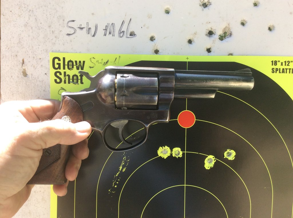 4 shots 38 special 125 gr plated bullets  shot DA with the Ruger PS 6  from 10 yds.jpg