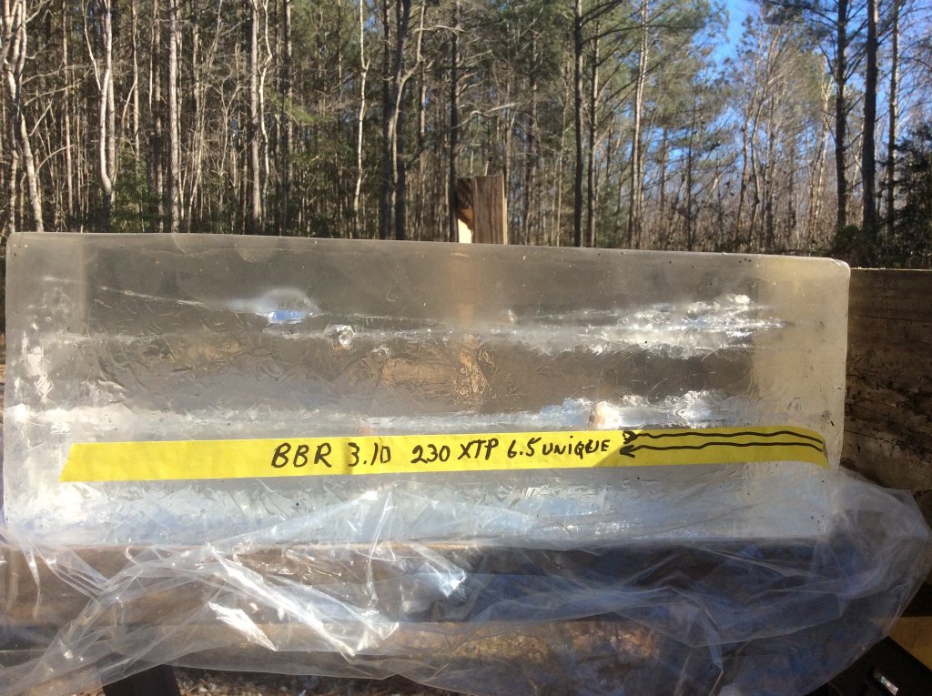 XTP load gel test with bullet going full 16 inch hitting block.jpg