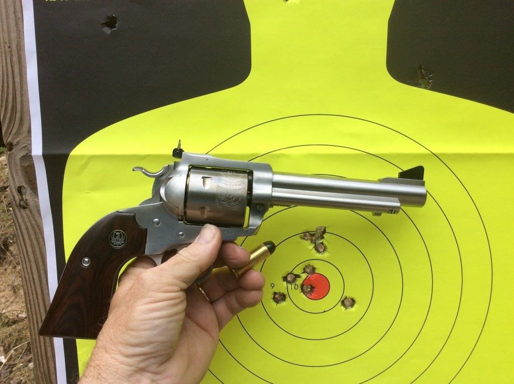 ruger bisley BH 45 colt hits from 12 yds. 250 gr with 6 gr red dot.jpg