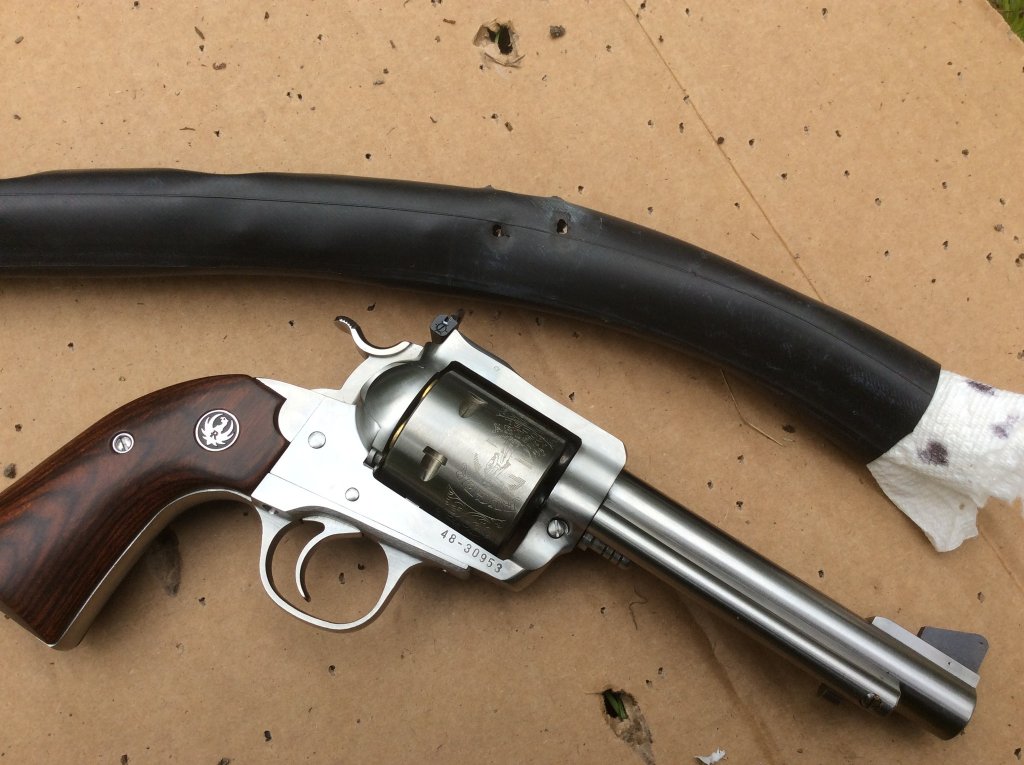 pair of deadly 45 hits on snake target.jpg