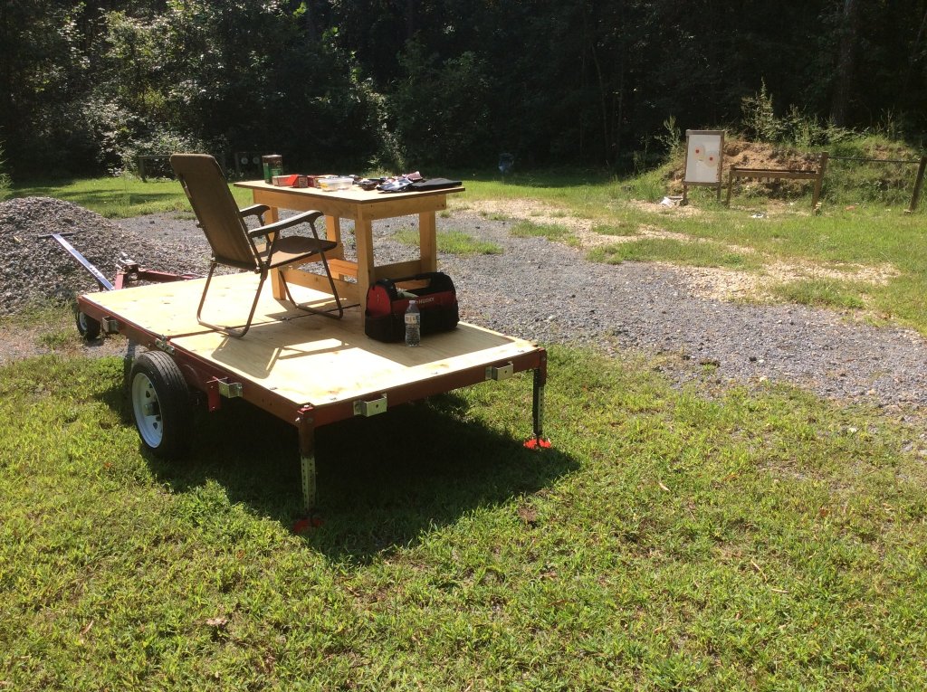 13 yd from paper plate targets and the swinging plates to the left further out..jpg