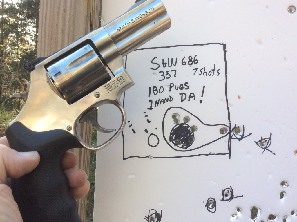 double action shots from 8 yds one hand.jpg