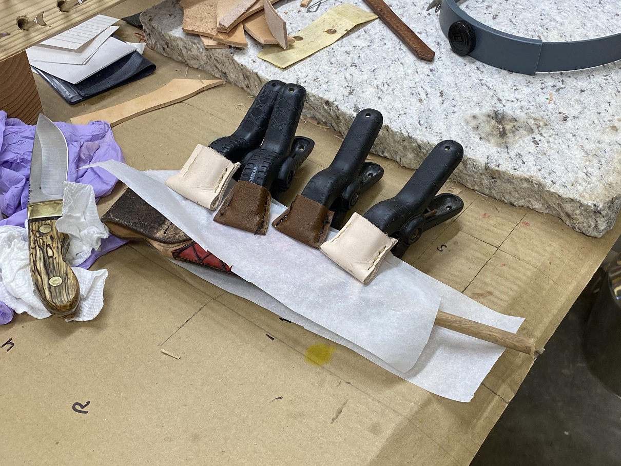 29 rolled the sheath and glued and clamped.jpg