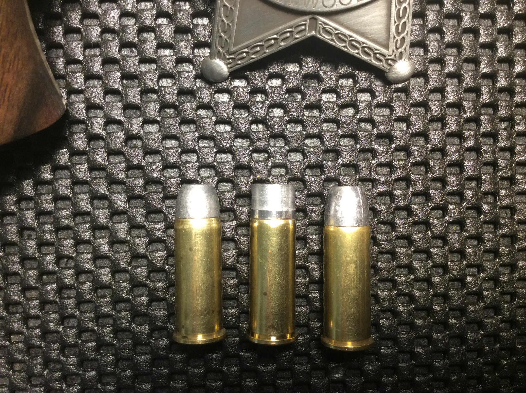 new round to test   .44 special 250 gr full wad cutter in middle.jpg