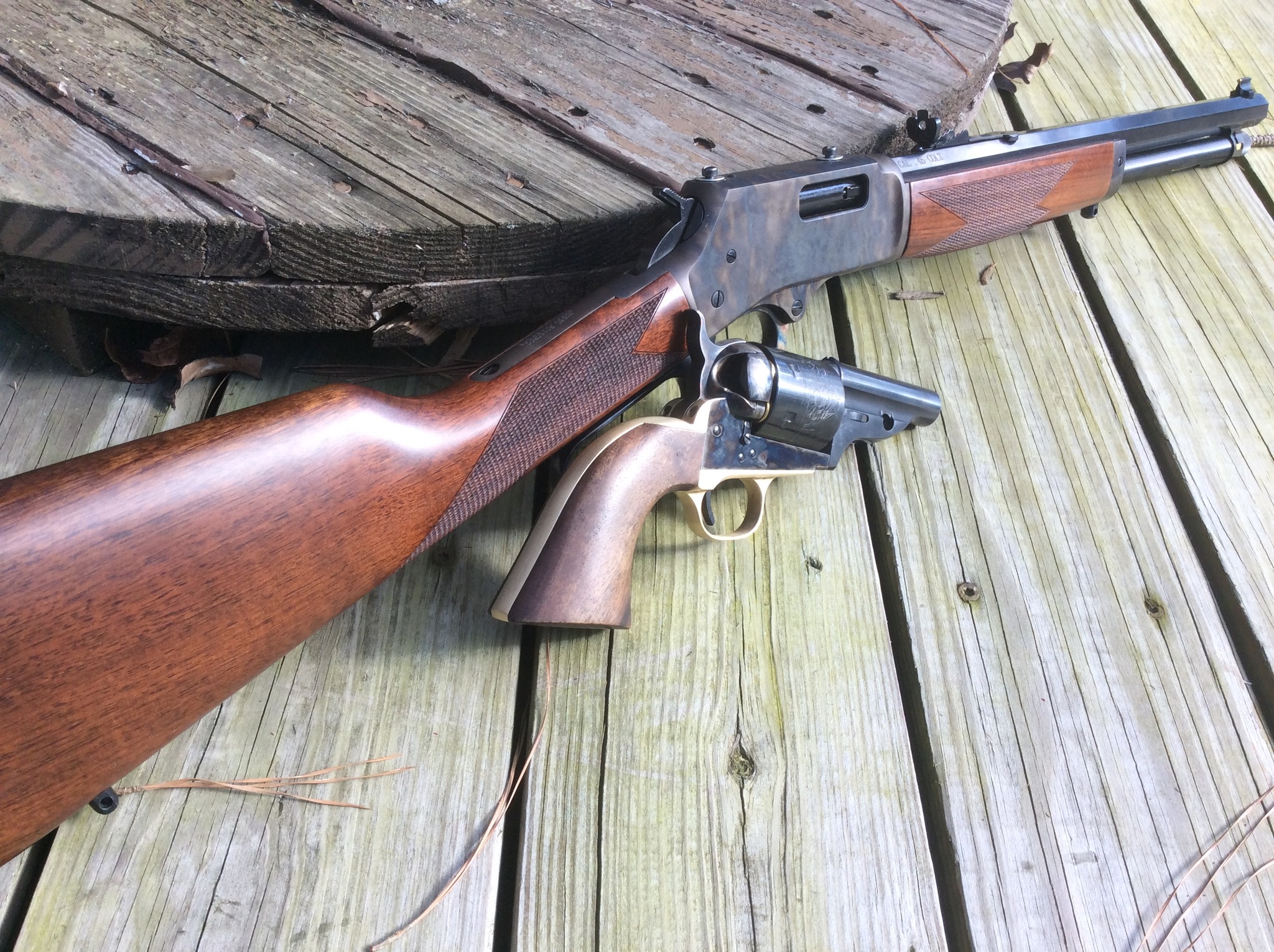 couple nice shooters the Henry 45 Colt CCH Carbine and 1872 44 Colt Open Top.jpg