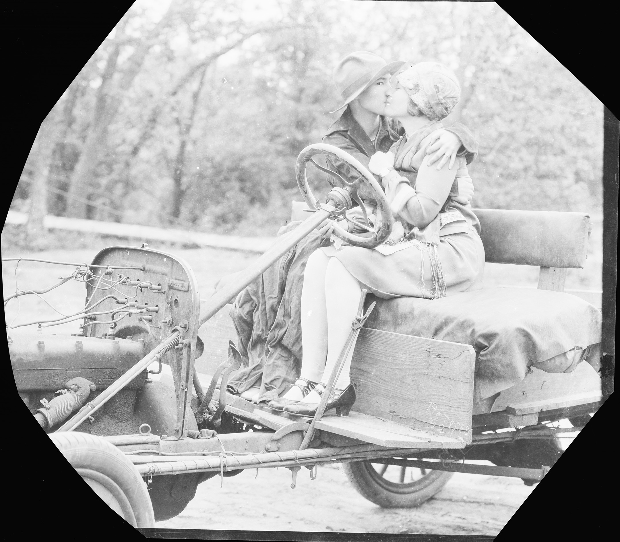Couple Sitting on a Car.jpg