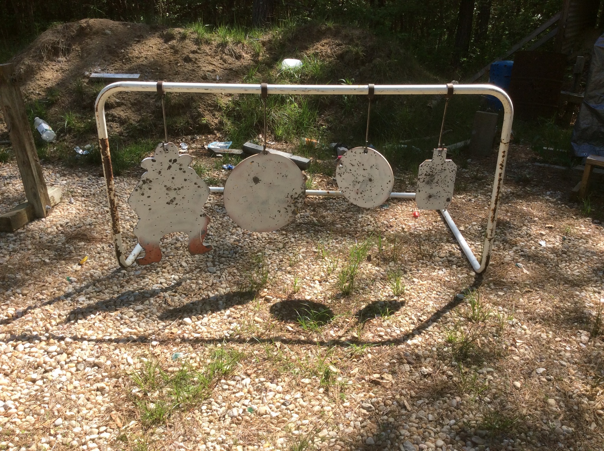 4 steel targets on the new hangers.jpg