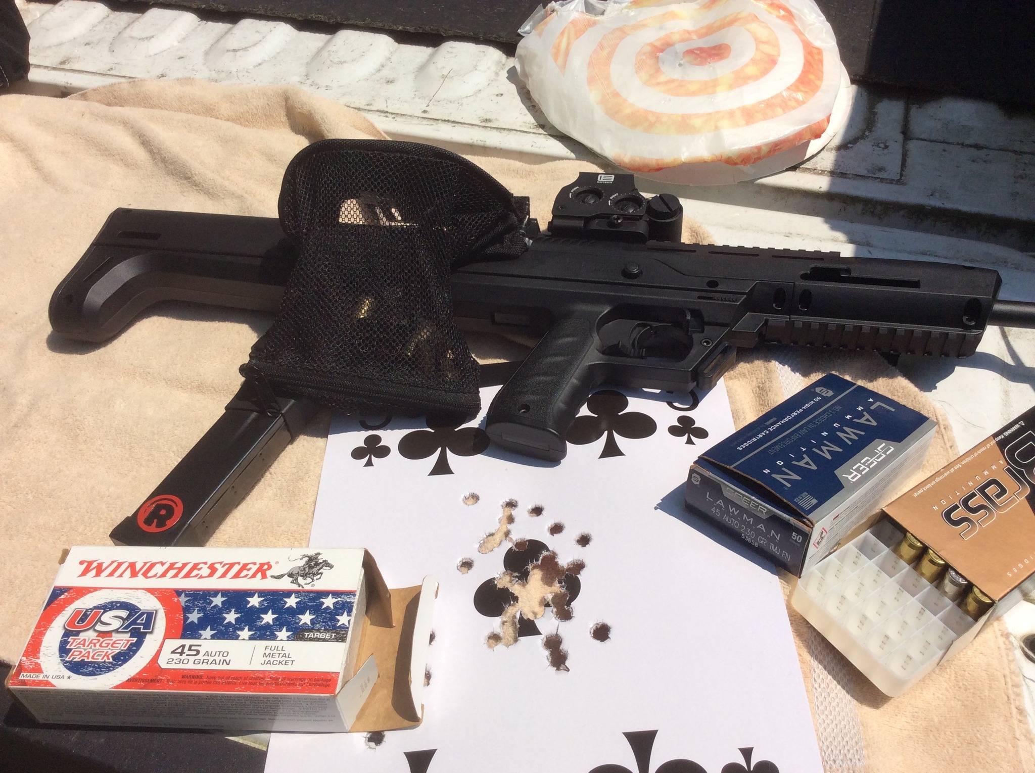 testing the brass catcher on the hipoint bullpup and target from 15yds.jpg