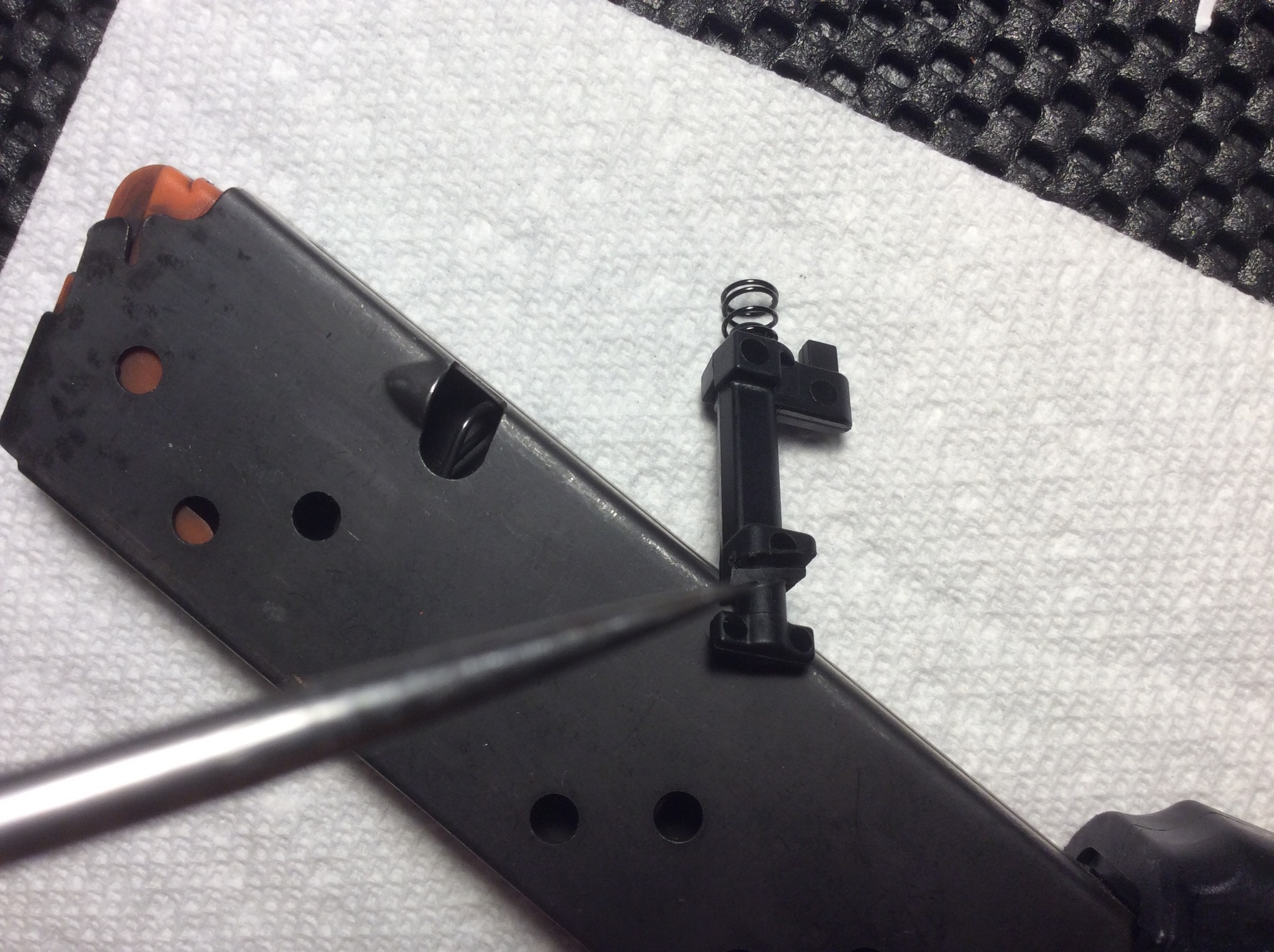new improved piece locks in deeper but still plastic.jpg