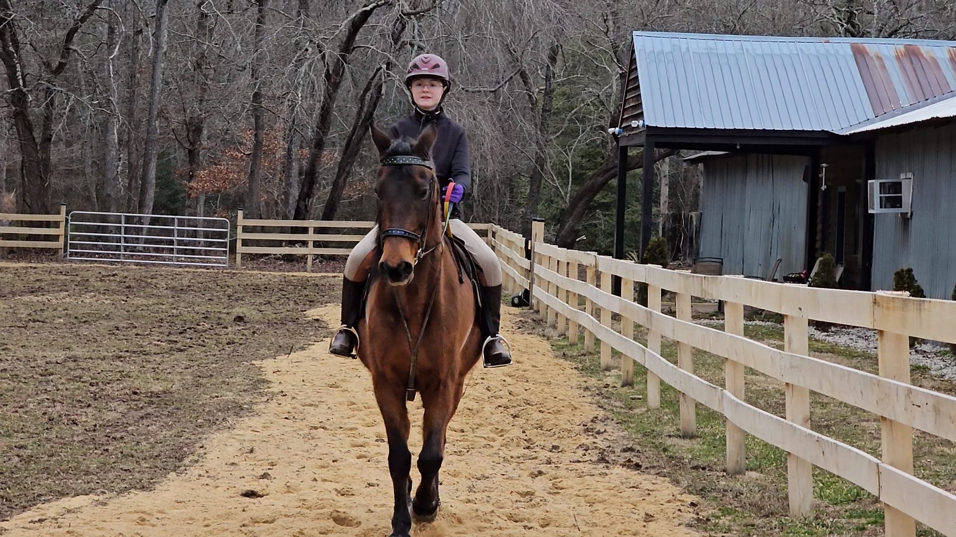 Macie learning to ride a horse.jpg