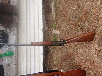Left out of the first photo in error.....H&amp;R Classic Carbine in 45 Colt