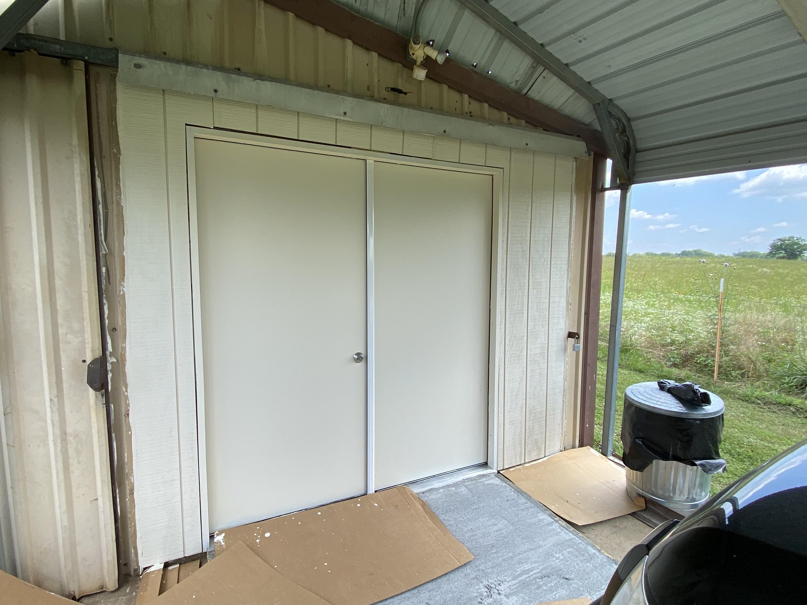 14 doors and siding painted.jpg