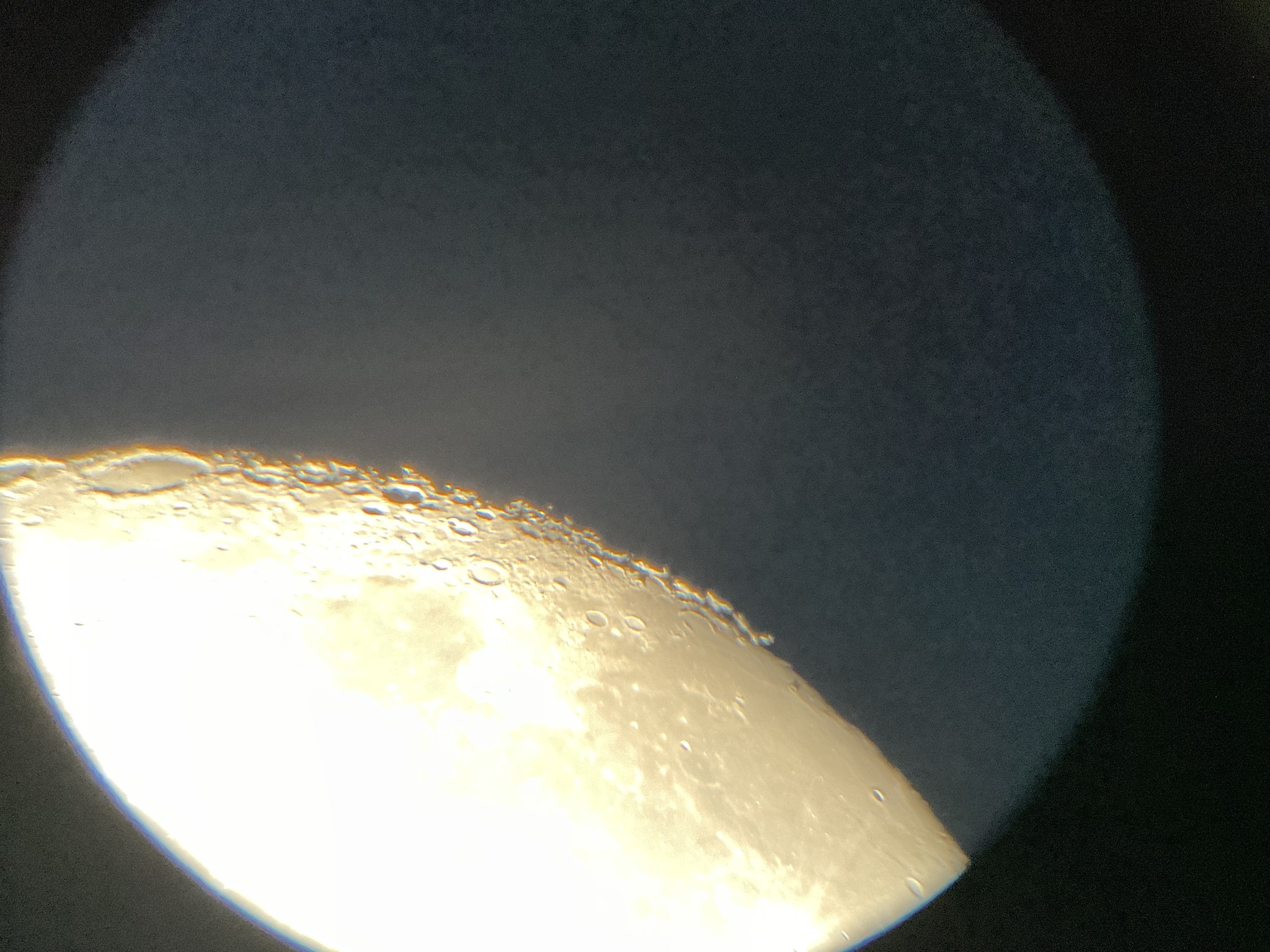 holding my iPad up to the eye piece Great shot of the moon 3 11 25.jpg