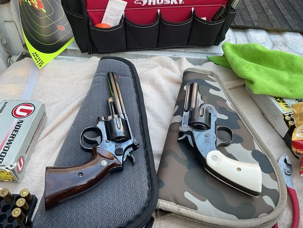 nicely blued 6 shooters.jpg