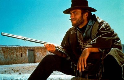 Clint_Eastwood_Holding_Rifle_Cowboy_HD_Wallpaper_Vvallpaper.NET_[1].jpg